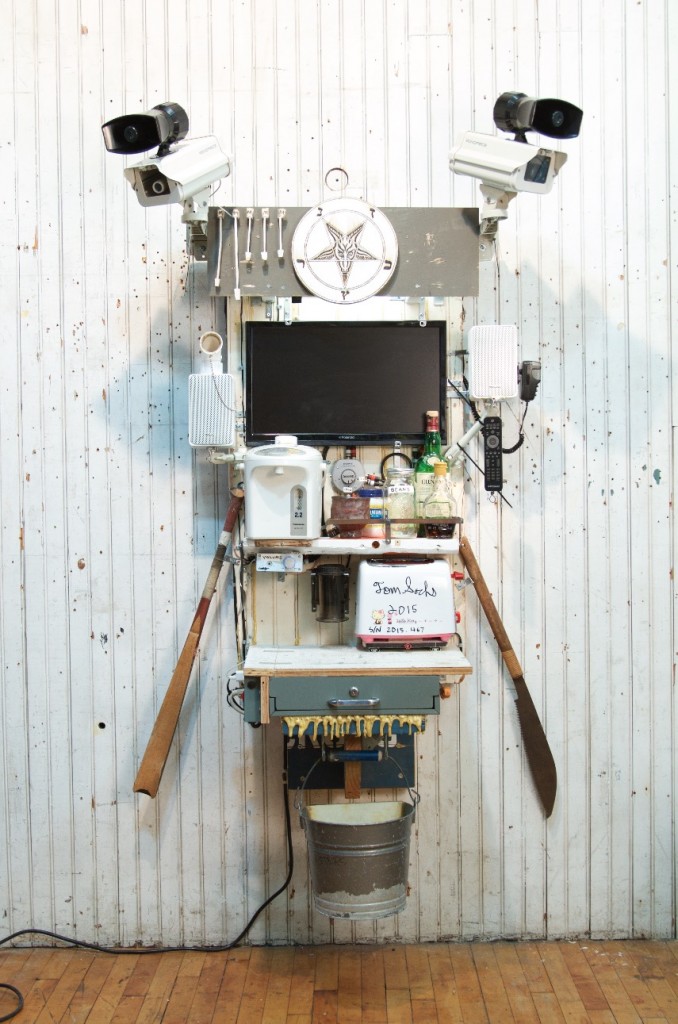 Tom Sachs, Breakfast, 2016. Wood, steel, stoneware, porcelain, toaster, tv, pirated DVDs, water boiler, coffee, sugar, maple syrup, whiskey, stereo amplifier, speakers, surveillance cameras, loudspeaker, epoxy resin and fiberglass. 70 x 42 x 30 inches.
